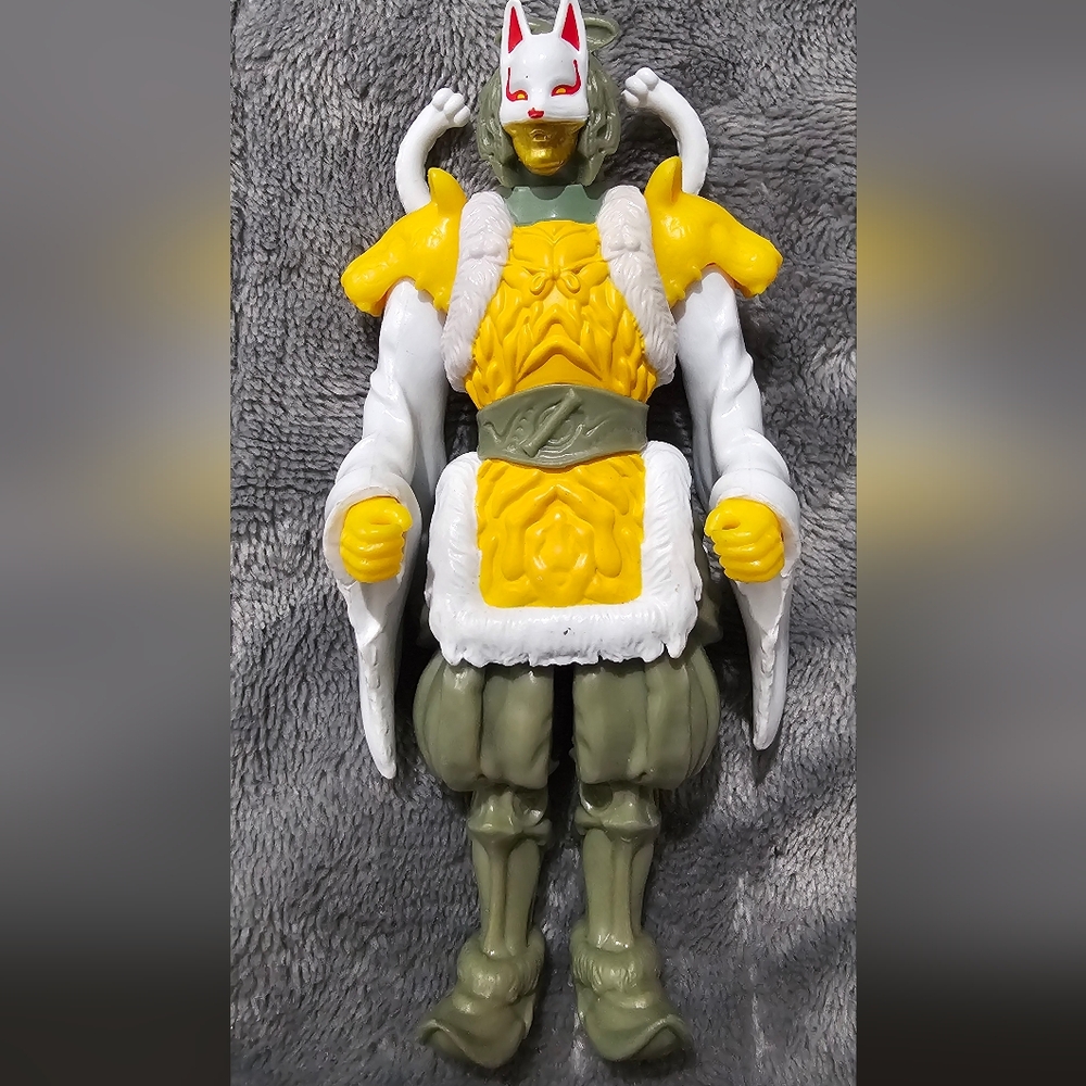 Yellow and White Action Figure